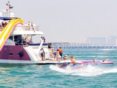 Shared Tour - YACHT RIDE & SLIDE - 4HR (Includes Food, Slides, Drinks)