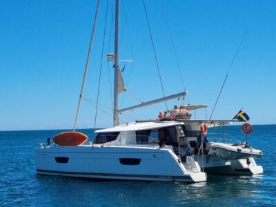 Fountaine Pajot Helia 44 Private Catamaran Charter with Captain, Crew & Water Toys