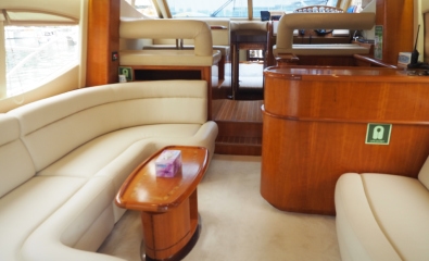 Sleek Flybridge Private Yacht Charter in Singapore with Water Toys