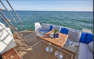 112' Custom Privilege Superyacht Charter in Miami | 2 Jacuzzis, Sauna, Jet Skis & Aquabana Included | AnchorsBook Photo Luxury 50’ Beneteau Yacht Experience in Miami + Open Bar & Jet Ski Included