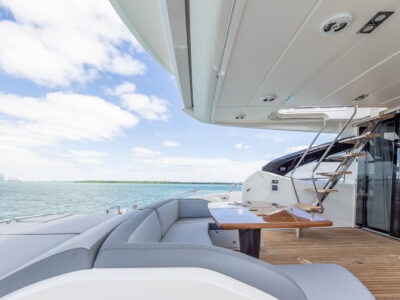 112' Custom Privilege Superyacht Charter in Miami | 2 Jacuzzis, Sauna, Jet Skis & Aquabana Included | AnchorsBook Photo Experience Waterfront Elegance on the 74’ Princess in North Bay Village